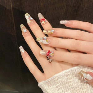 Colorful butterfly press-on nails with 3D bows, crystals, and cat-eye glitter finish