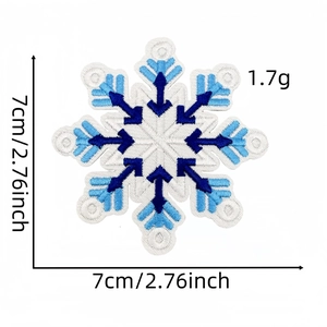 Detail showing blue and white snowflake embroidered patch with 7cm size measurements
