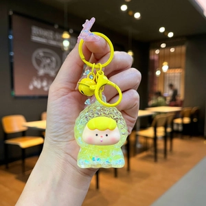 Mignon porte-clés personnage durian jaune avec paillettes en résine acrylique fluide