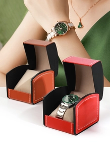 Detail of PU leather watch box with white stitching and plush velvet cushion