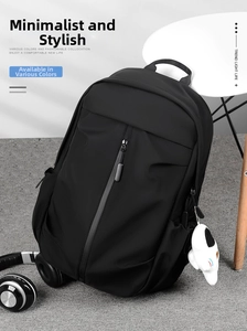 Detail of waterproof black oxford backpack with front vertical zipper and plush pendant