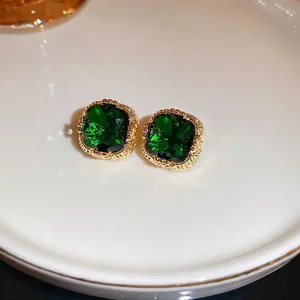 Square emerald zircon stud earrings with vintage gold-plated embossed metal texture