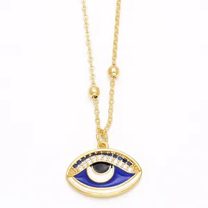 18K gold plated evil eye necklace featuring blue enamel and cubic zirconia details