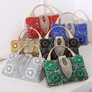 Elegant luxury crystal evening clutch bags with metallic handles in multiple vivid colors
