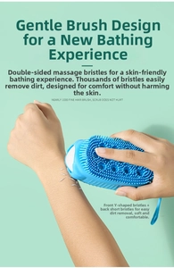 Detail of dual-sided blue silicone bath brush with dense soft bristles and massage bumps