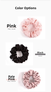 Detailed shot of 19mm mulberry silk scrunchies in pink, black, and pale pinkish tones