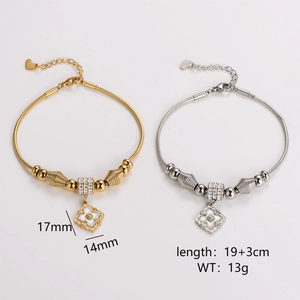 Adjustable gold and silver clover charm bracelets with inlaid shell and crystal detailing