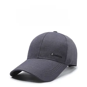 Close-up of dark grey baseball cap showing breathable mesh panels and fashion patch