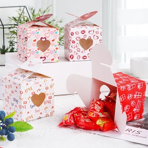 Square paper candy gift boxes with heart window and ribbon bow for Valentines Day