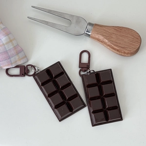 Realistic chocolate bar keychain charms in dark brown finish for handbags and gifts