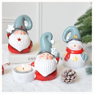 Three-piece Christmas ceramic set featuring Gnomes and Snowman with a tea light candle