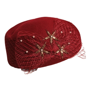 Elegant wine red wool beret with net veil, pearls, and gold star bead embroidery