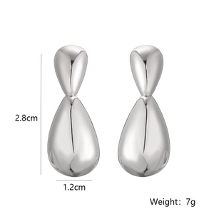 Detailed view of silver teardrop earrings showing 2.8cm height and 1.2cm width dimensions