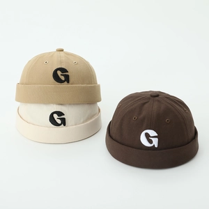 Kids G-letter embroidered brimless dock caps in khaki, cream, and dark brown colors