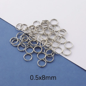 Detailed macro view of 0.5x8mm silver stainless steel split rings for jewelry making