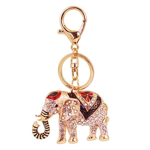 Portachiavi a forma di elefante con strass scintillanti e dettagli in smalto su sfondo bianco