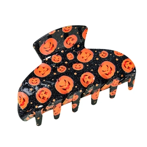 Grande pince à cheveux Halloween avec base noire et motifs de lanternes citrouilles