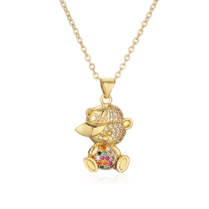 Gold bear pendant necklace with colorful gemstones and Cool engraving on white background