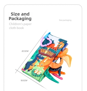 Detail of baby dinosaur cloth book with colorful 3D tails and a purple hanging ring