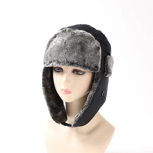 Classic black winter Ushanka hat with thick grey faux fur lining and ear flaps