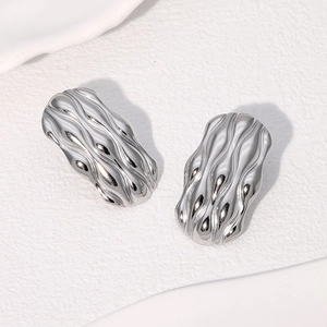 Modern minimalist silver stainless steel stud earrings with irregular ripple texture finish