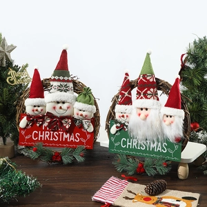 Christmas rattan wreath with Santa and Snowman figures for festive holiday door decoration