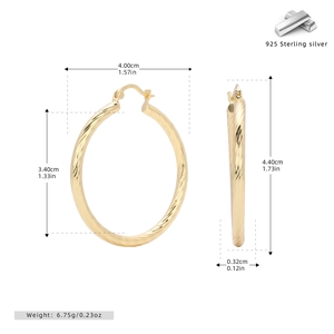 Detailed view of large gold-plated twisted 925 sterling silver hoop earrings with measurements