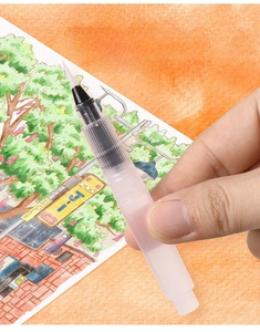 Detail of refillable water brush pen with fiber tip used on watercolor painting