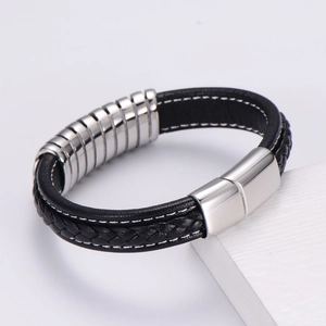 Braided black leather men's bracelet with silver magnetic clasp on white background