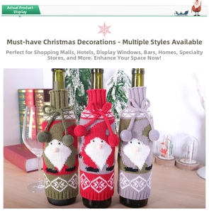Close-up of three knitted Santa wine bottle covers in red, green and grey festive colors