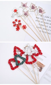 Close-up of Christmas bouquet decorations with felt stars, trees and ribbons