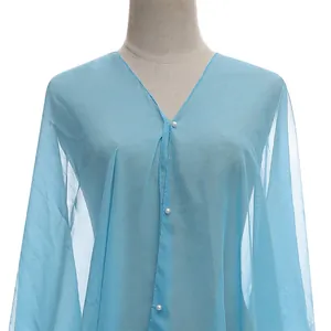 Light blue sheer chiffon shrug featuring delicate pearl buttons and a stylish V-neck cut