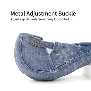 Denim beret hat with adjustable golden metal buckle showing twill texture on white background