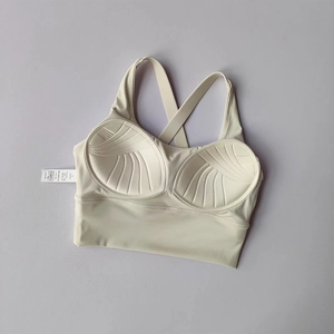 Soutien-gorge de sport blanc crème avec texture coquille et dos nageur pour fitness