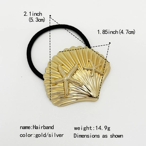 Detail showing dimensions of gold metallic bow hairband, measuring 2.1 by 1.85 inches
