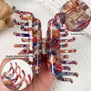 Acetate hair claw clip with double-row backbone design and colorful marble texture