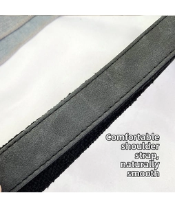 Close-up of comfortable black suede shoulder strap with durable reinforced double stitching
