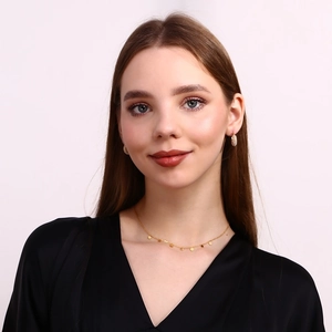 18K gold plated stainless steel necklace and earring set featuring mini daisy charms