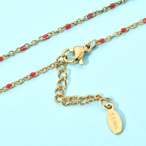 Bohemian gold stainless steel chain bracelet with red enamel oval charms and lobster clasp