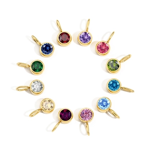 Stainless steel gold plated round pendants with colorful birthstone crystals arranged in a circle