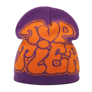 Purple knit beanie with orange graffiti jacquard pattern for street style winter wear
