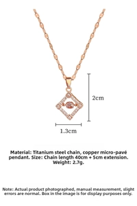 Macro shot of rose gold dancing stone pendant with pink gem and titanium steel chain