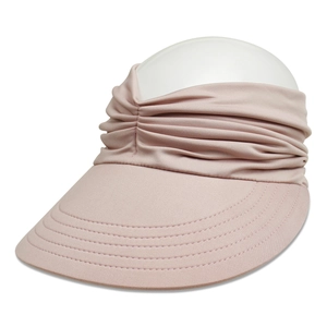 Close-up of pink sun visor hat with ruched headband and wide brim