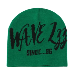 Detail of green knitted beanie with black WAVE 22 jacquard lettering and soft texture