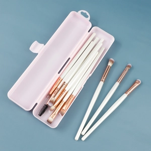 Pink storage case with rose gold makeup brushes and soft gradient bristles detail