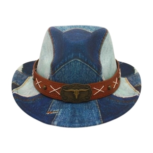 Close-up of vintage cow head metal buckle and brown leather band on blue cowboy hat
