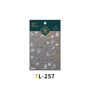 Macro view of TL-257 3D embossed Christmas nail stickers with gold deer and snowflakes