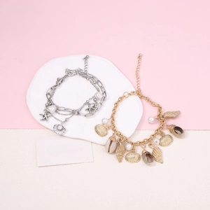 Fashionable gold and silver chain bracelets with starfish shells and faux pearls