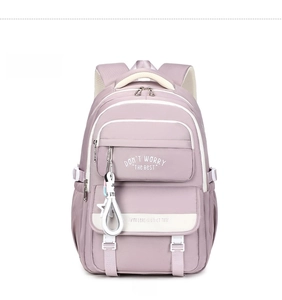 Detail view of purple waterproof student backpack with functional pockets and white zippers