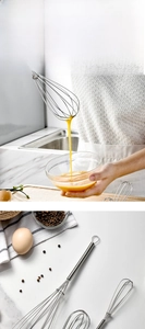 Macro shot of stainless steel spring whisk with multi-wire design and hanging hook